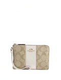 Coach Corner Zip Wristlet In Signature Canvas