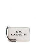 Coach Corner Zip Wristlet In Signature Canvas