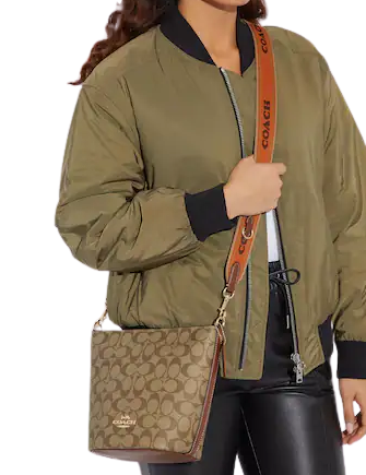 Coach Logan Duffle In Signature Canvas