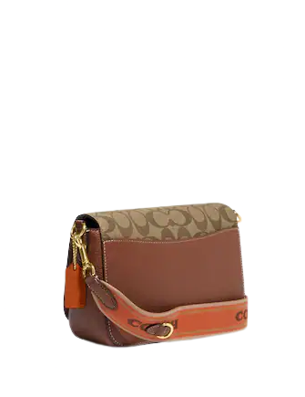 Coach Logan Messenger In Signature Canvas