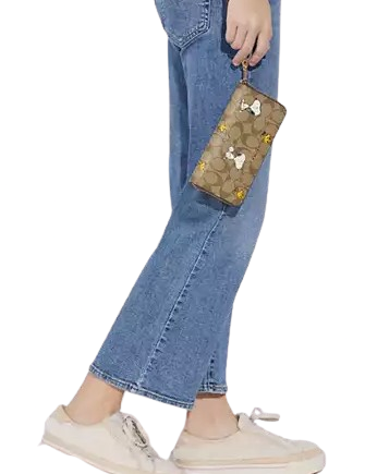 Coach Coach X Peanuts Long Zip Around Wallet In Signature Canvas With Snoopy Woodstock Print