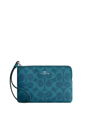 Coach Corner Zip Wristlet In Signature Canvas