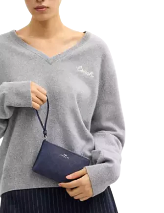 Coach Corner Zip Wristlet In Signature Canvas