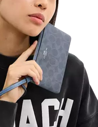 Coach Corner Zip Wristlet In Signature Canvas