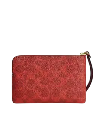 Coach Corner Zip Wristlet In Signature Canvas