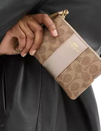 Coach Corner Zip Wristlet In Signature Canvas