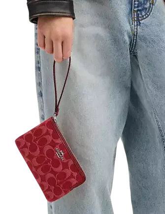 Coach Corner Zip Wristlet In Signature Denim