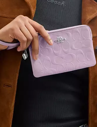 Coach Corner Zip Wristlet In Signature Leather With Heart Charm