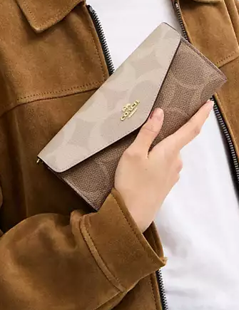 Coach Klare Wallet With Chain In Blocked Signature Canvas