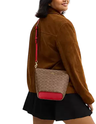 Coach Logan Duffle Bag In Signature Canvas