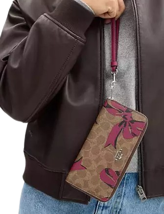 Coach Long Zip Around Wallet In Signature Canvas With Bow Print