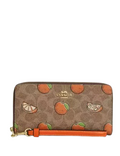 Coach Long Zip Around Wallet In Signature Canvas With Orange Print
