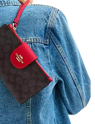 Coach Phone Wallet In Signature Canvas