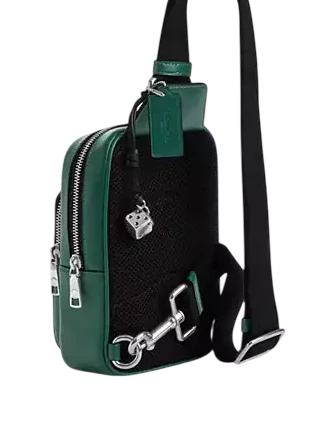 Coach Racer Sling Pack In Signature Canvas With Charms