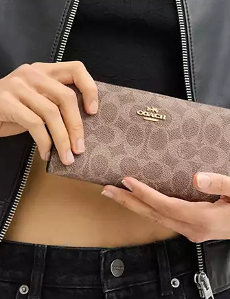 Coach Slim Zip Wallet In Signature Canvas