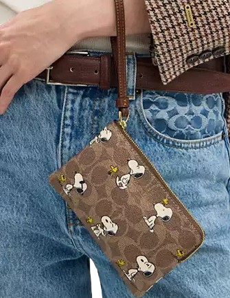 Coach X Peanuts Corner Zip Wristlet In Signature Canvas With Snoopy Print