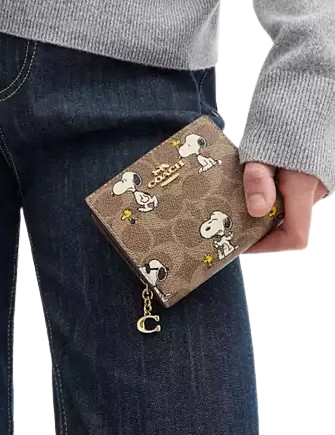 Coach X Peanuts Snap Wallet In Signature Canvas With Snoopy Print