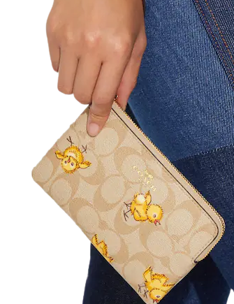 Coach Corner Zip Wristlet In Signature Canvas With Tossed Chick Print